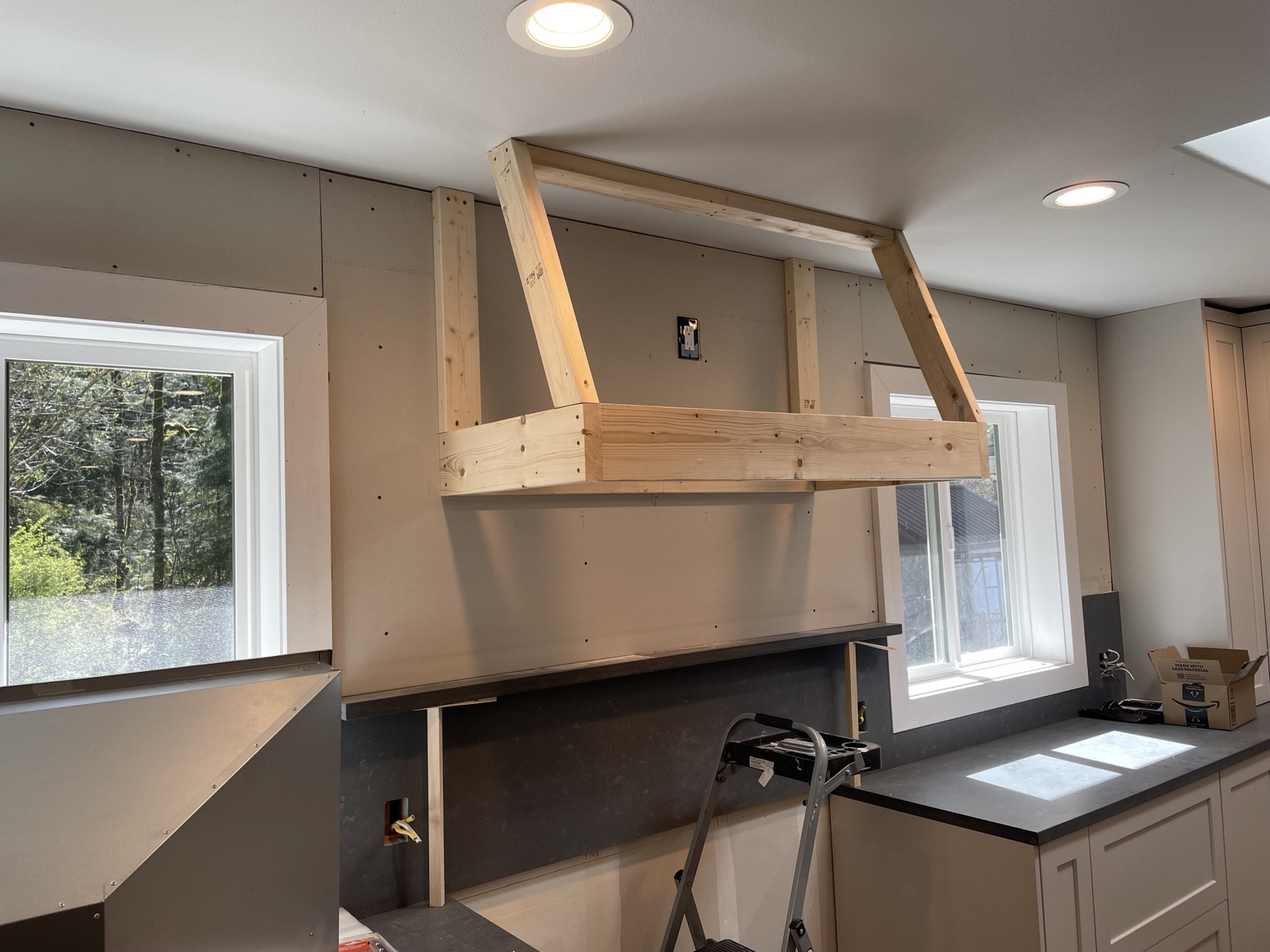 Timber framing for a kitchen range hood during construction